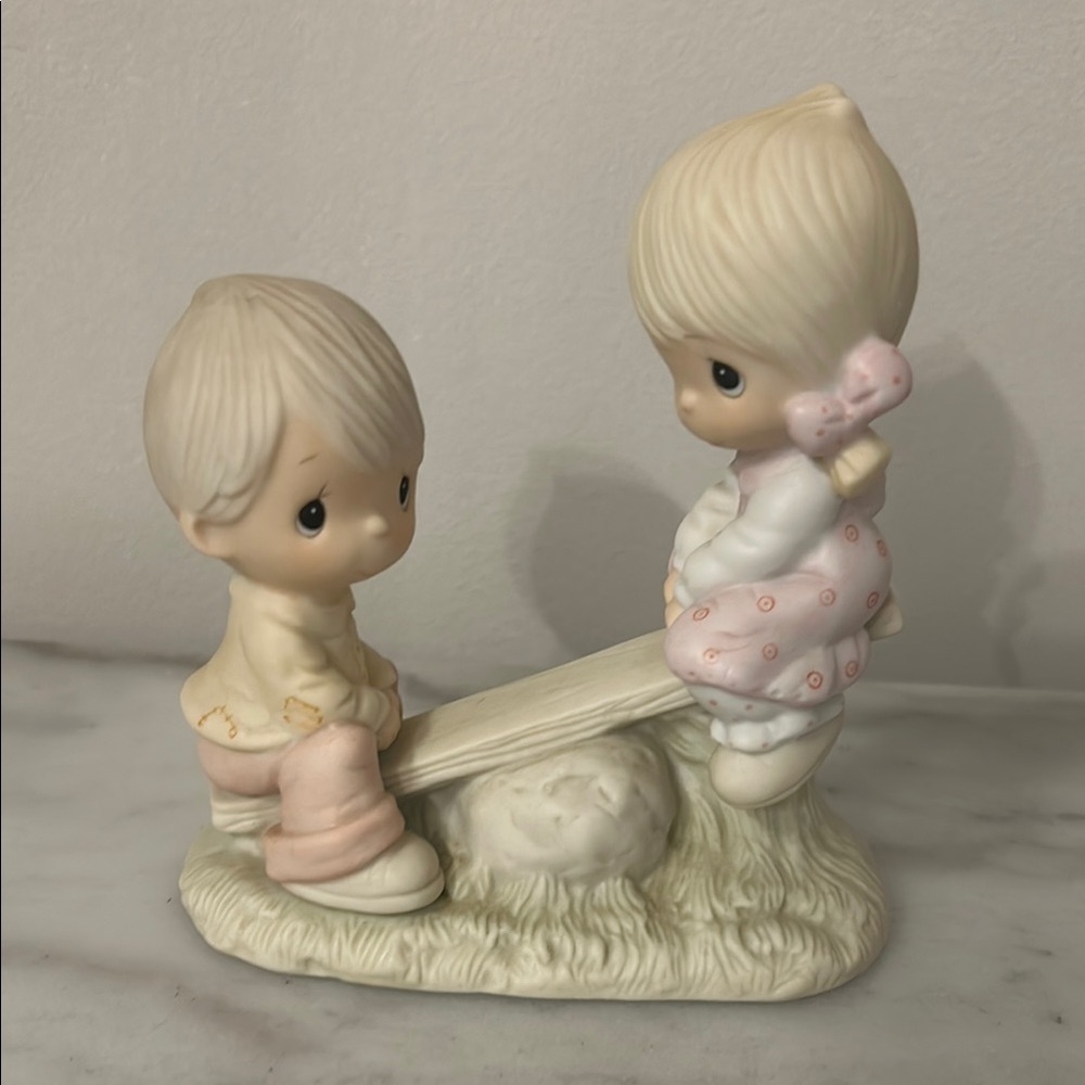 Charming Child Figurine with Pastel Accents
